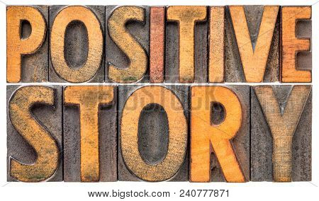 positive story - isolated word abstract in vintage letterpres wood type