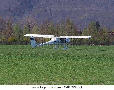 Bielsko-biala, Poland On April 2018: Focus On White Pipistrel Virus Sw Airplane On Grassy Airfield C