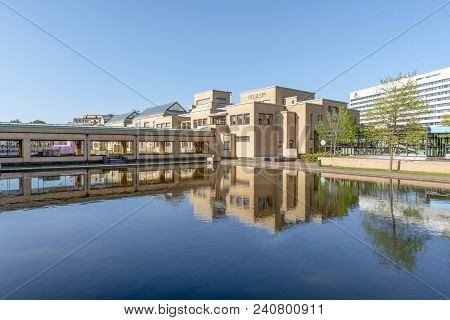 The Hague, 7 May 2018 - Reflection Of The Museon, The Municipality Museum Under A Blue And Shiny Spr