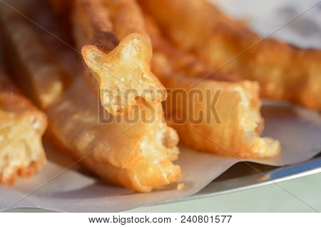 Typical Spanish Snack Churros Are Deep-fried Pastries  And Served With Hot Chocolate Everywhere In S