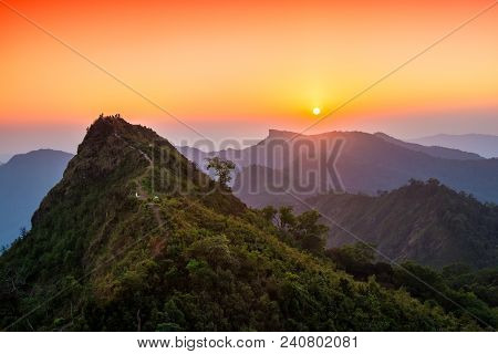 View Of Sunset Over Phu Chi Fah From Phu Chi Dao Viewpoint In Chiang Rai, Thailand.
