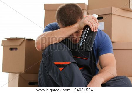 Hand Specialist Courier Delivery Service Holding Botle In Hand Background Of Boxes Carried Out Deliv