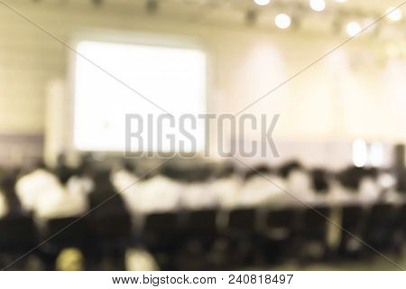 Blurred Abstract Background Of Business Or Educational Conference Seminar In Auditorium Hall