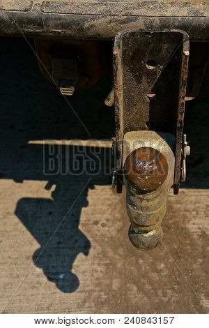 An Adjustable Ball Mounted Trailer Hitch On A Truck.
