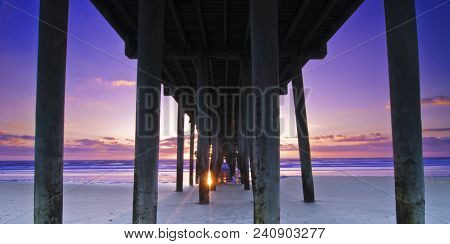 Violet: Sunrise Over Atlantic Ocean At Amelia Island Fishing Pier, Jacksonville, Florida