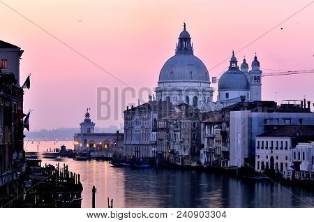 Cathedral In Venice, Italy Over The Grand Canal At Sunrise