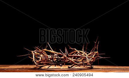 An Authentic Crown Of Thorns On A Wooden Background. Easter Theme
