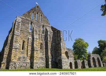Part Of The Ruins Of The Historic Battle Abbey In The Town Of Battle In East Sussex.  The Abbey Is L
