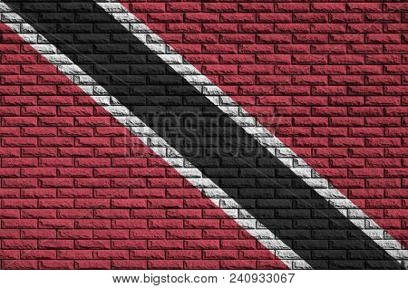 Trinidad And Tobago Flag Is Painted Onto An Old Brick Wall