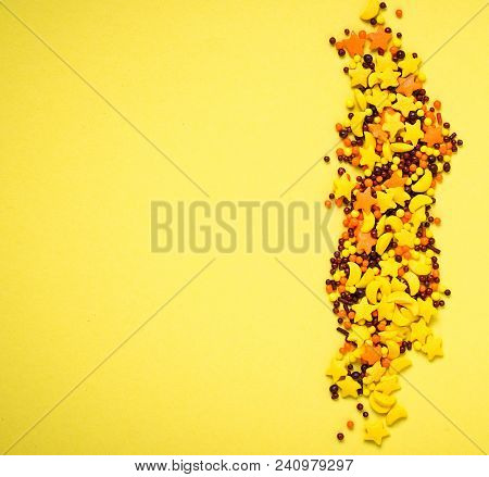 Colorful Nonpareil On Yellow Background. Top View, Square Image