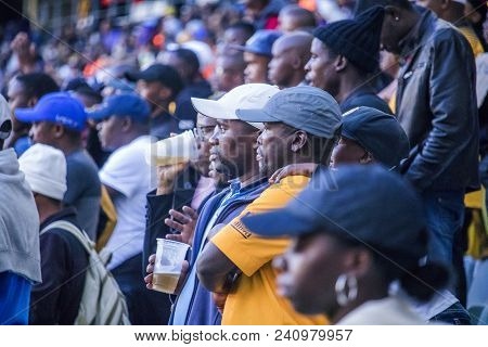 Cape Town, South Africa, 12 May 2018 - Diverse South African Football Supporters Watching Intensely 