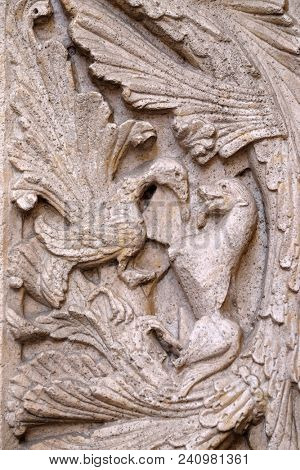 MODENA, ITALY - JUNE 04: Stone carvings on Modena Cathedral dedicated to the Assumption of the Virgin Mary and Saint Geminianus, Italy on June 04, 2017.