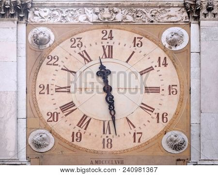 MODENA, ITALY - JUNE 04: Clock tower, Modena town Hall on Piazza Grande, a unesco world heritage site, Modena, Italy on June 04, 2017.