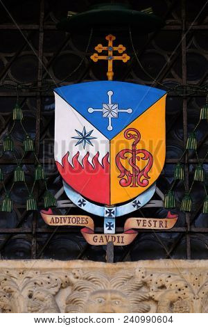 MODENA, ITALY - JUNE 04: Coat of Arms of Erio Castellucci archbishop of Modena-Nonantola, Italy on June 04, 2017.