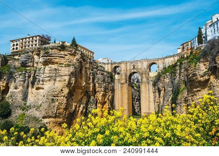 The Famous Stone Bridge Over The Gorge Of Tajo In Ronda, Andalusia, Spain