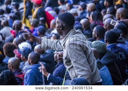 Cape Town, South Africa, 12 May 2018 - Diverse South African Football Supporter Arguing With A Decis