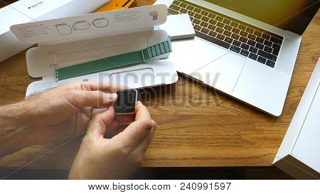 Paris, France - Apr 24, 2018: New Apple Watch Series 3 Smartwatch Change Strap To The New 42mm Marin