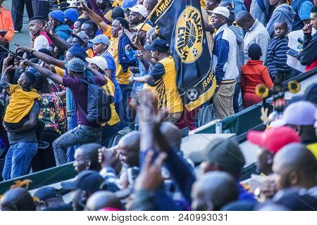 Cape Town, South Africa, 12 May 2018 - Diverse South African Football Supporters Cheering And Celebr