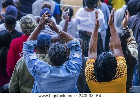 Cape Town, South Africa, 12 May 2018 - Diverse South African Football Supporters Cheering And Celebr