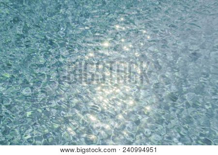 Colorful Twinkling Beach Reflect Bokeh Light Background.