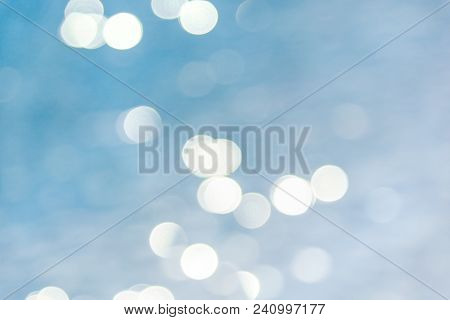 Colorful Twinkling Beach Reflect Bokeh Light Background.