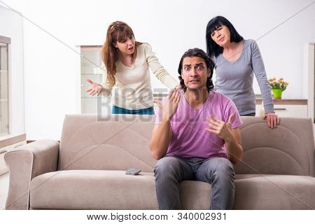 Young family and mother-in-law in family issues concept