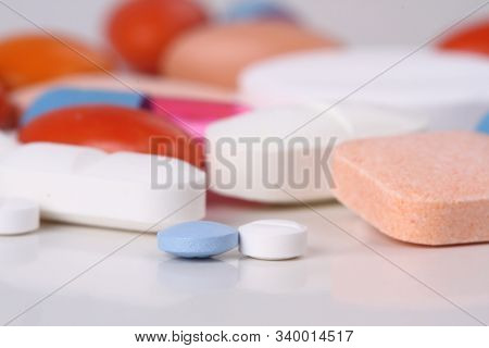 Drugs And Medicines - Different Color Pills On White Background