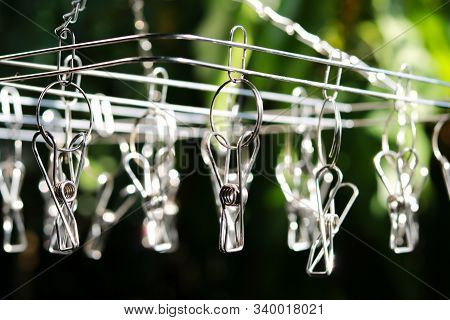 Close Up The Silver Clothespin In Sunlight
