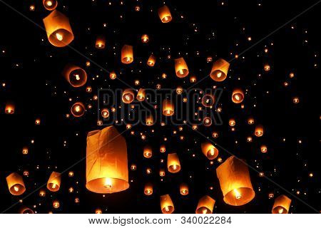 Swarms Of Sky Floating Lanterns Are Launched Into The Air During New Year's Eve And Yee Peng Lantern