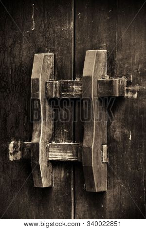 Door bolt closeup in Xiahao Old street in Chongqing, China.