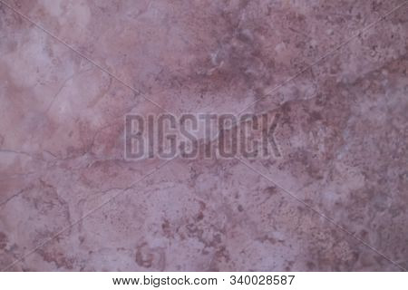 Blur close-up pattern of marble is a beautiful background. have some hole and small noise.