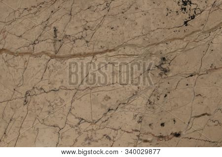 Blur Close-up Pattern Of Marble Is A Beautiful Background. Have Some Hole And Small Noise.