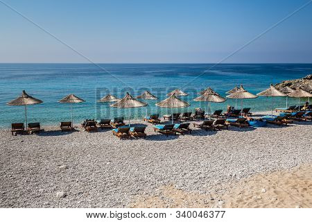 Sunbeds And Umbrellas On Dhermi Beach - Dhermi, Himar