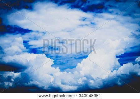 Blue Sky With Cloud Closeup . Sunlight With Blue Sky On Dark Background.vivid Sky On White Cloud. Na