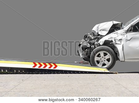 Accident Car Slide On  Truck For Move. White Car Have Damage By Accident On Road Take With Slide Tru