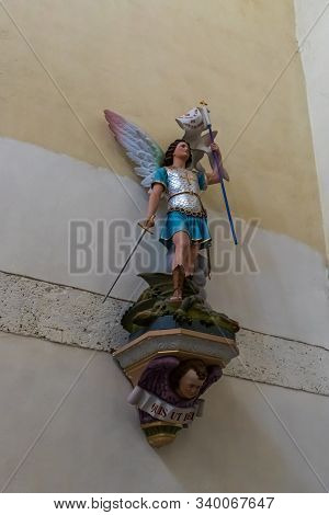 Jerusalem, Israel, December 07, 2019 : Statue Of An Angel With A Sword On A Wall In Our Lady Of The 