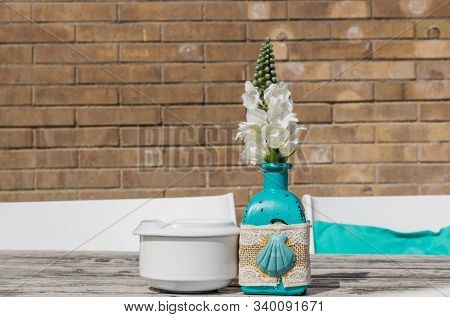 Warehouse On The Open Air. Chairs And Tables Outside On The Summer Sun Weather. Vase With The Flower