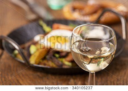Wine And Tyrolean Potato Groestl In A Pan