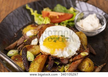 Tyrolean Potato Groestl In A Pan On Wood