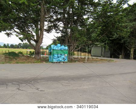 Masterton, Wairarapa / New Zealand - December 17, 2019 Bins Of Household Council Rubbish Bags Waste 