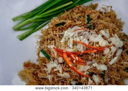 Asian Eating Food, Mee Grob Is An Sweet And Sour Crispy Noodles, Made From Thai Rice Noodle With Swe