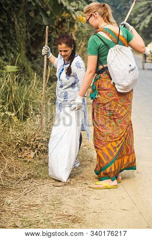 Mayapur, West Bengal, India - Dec 14, 2019. Volunteers Collecting Garbage In India. International Ec