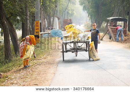 Mayapur, West Bengal, India - Dec 14, 2019. Volunteers Collecting Garbage In India. International Ec