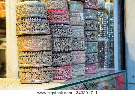 Colorful Metallic Brocade Decorations On Display For Sale In Chandi Chowk Old Delhi. These Flowers, 