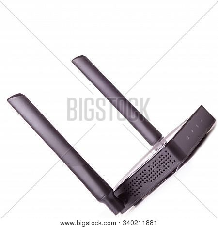 Black Wifi Router Isoltaed On A White With Two Antennas
