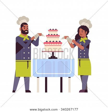 Cooks Couple Professional Pastry Chefs Decorating Tasty Wedding Cream Cake African American Woman Ma