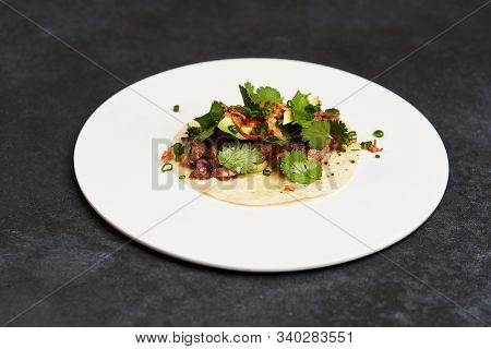 Mexican Tacos With Beef, Tomatoes, Avocado, Chilli And Onion