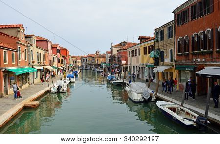 Murano, Venice, Italy - September 23. 2017: View Of Murano Venice Shops And Boats  On Canal.