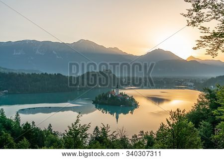 Bled Glacier Lake Landscape In Slovenia At Idillyc Sunrise, In The Julian Alps