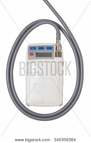 Blood Pressure Monitor. Close-up Of An Outpatient 24 Hours Blood Pressure Monitor System Isolated On
